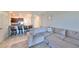 Living room with sectional sofa and view of kitchen at 928 Royal Empress Dr, Ruskin, FL 33570