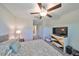 Primary bedroom with a queen bed and ceiling fan at 928 Royal Empress Dr, Ruskin, FL 33570