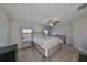 Spacious main bedroom with lake view and ceiling fan at 928 Royal Empress Dr, Ruskin, FL 33570