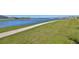 Community lake with walking path and lush landscaping at 928 Royal Empress Dr, Ruskin, FL 33570
