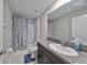 Clean bathroom with granite vanity and shower/tub combo at 928 Royal Empress Dr, Ruskin, FL 33570