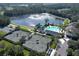 Aerial view of community pool and tennis courts at 4716 Hickory Oak Dr, Brooksville, FL 34601