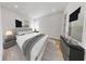 Spacious bedroom with plush bedding and modern nightstands at 4716 Hickory Oak Dr, Brooksville, FL 34601