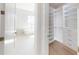 Spa-like bathroom with marble finishes and walk-in shower at 4716 Hickory Oak Dr, Brooksville, FL 34601