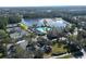 Community pool, tennis courts, and clubhouse at 4716 Hickory Oak Dr, Brooksville, FL 34601
