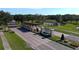 Gated community entrance with a brick sign and landscaping at 4716 Hickory Oak Dr, Brooksville, FL 34601