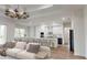 Open concept kitchen and living area with modern appliances and island at 4716 Hickory Oak Dr, Brooksville, FL 34601