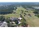 Aerial view of golf course and clubhouse at 4716 Hickory Oak Dr, Brooksville, FL 34601