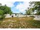 Backyard with detached structure and grassy area at 10206 N 28Th St, Tampa, FL 33612