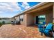 Spacious patio with seating area, great for entertaining at 15502 Black Pepper Ln, Odessa, FL 33556