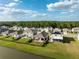 Aerial view of homes near a canal at 15502 Black Pepper Ln, Odessa, FL 33556