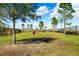 Dog park with agility equipment and shaded areas at 15502 Black Pepper Ln, Odessa, FL 33556