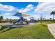playground with slides and climbing structures at 15502 Black Pepper Ln, Odessa, FL 33556