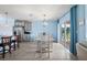 Modern kitchen with stainless steel appliances and granite countertops at 15502 Black Pepper Ln, Odessa, FL 33556