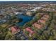 Aerial view of the apartment complex surrounded by nature at 2690 Coral Landings Blvd # 722, Palm Harbor, FL 34684