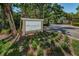Welcome to Meadowlake Palm Harbor, beautifully landscaped entrance with colorful flowers and lush greenery at 2690 Coral Landings Blvd # 722, Palm Harbor, FL 34684
