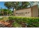 Welcome to Meadowlake Palm Harbor, beautifully landscaped entrance with lush greenery at 2690 Coral Landings Blvd # 722, Palm Harbor, FL 34684