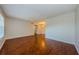 Spacious, bright living room featuring sleek laminate flooring and a large window providing natural light at 2690 Coral Landings Blvd # 722, Palm Harbor, FL 34684