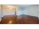 Bright and airy open concept living and dining area with sleek laminate flooring, perfect for entertaining at 2690 Coral Landings Blvd # 722, Palm Harbor, FL 34684