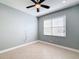 Spacious bedroom with ceiling fan and window coverings at 4847 Marble Springs Cir, Wimauma, FL 33598