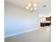 Bright dining room featuring a chandelier and tile floors at 4847 Marble Springs Cir, Wimauma, FL 33598