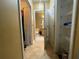 Bathroom with tile flooring, linen closet, and a toilet at 6007 Skydale Way # 201, Riverview, FL 33578