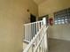 Building entrance with white railings and unit number 201 at 6007 Skydale Way # 201, Riverview, FL 33578