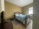 Bedroom with double bed and tiled floors at 6007 Skydale Way # 201, Riverview, FL 33578
