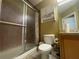 Bathroom with shower/tub combo, toilet and vanity at 6007 Skydale Way # 201, Riverview, FL 33578