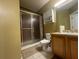 Bathroom with shower/tub combo, toilet and vanity at 6007 Skydale Way # 201, Riverview, FL 33578