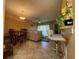 Combined dining and living room with tile floors and neutral decor at 6007 Skydale Way # 201, Riverview, FL 33578