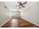 Spacious living room with hardwood floors and ceiling fans at 700 Island Way # 106, Clearwater Beach, FL 33767