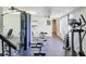 Well-equipped gym featuring weight machines, elliptical, and free weights for residents' fitness needs at 700 Island Way # 106, Clearwater Beach, FL 33767