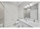 Clean bathroom with vanity, toilet, and shower at 8852 Prairie Creek Dr, New Port Richey, FL 34655