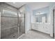 Elegant bathroom with double vanity and large shower at 8852 Prairie Creek Dr, New Port Richey, FL 34655