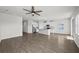 Open concept kitchen with island and view of living area at 8852 Prairie Creek Dr, New Port Richey, FL 34655