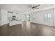 Modern kitchen with white cabinets, granite countertops, and island at 8852 Prairie Creek Dr, New Port Richey, FL 34655