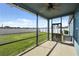 Screened porch overlooking the backyard at 8852 Prairie Creek Dr, New Port Richey, FL 34655