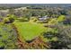 Aerial view showing home and expansive property at 1810 Curry Rd, Lutz, FL 33549