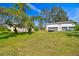 One story home with detached garage and large yard at 1810 Curry Rd, Lutz, FL 33549