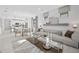 Open concept living space seamlessly connecting to kitchen and dining areas, creating a spacious feel at 18906 Indian Rock Pl, Lakewood Ranch, FL 34211