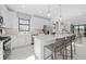 Open concept kitchen with island seating and modern finishes at 18906 Indian Rock Pl, Lakewood Ranch, FL 34211