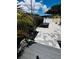 Outdoor patio area with dining table, grill, and paver stones at 2658 48Th S St, Gulfport, FL 33711