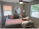Cozy bedroom with a queen-size bed and calming decor at 2658 48Th S St, Gulfport, FL 33711