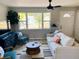 Spacious living room with large windows and modern furniture at 2658 48Th S St, Gulfport, FL 33711