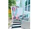 Relaxing outdoor shower with tropical accents and patio seating at 2658 48Th S St, Gulfport, FL 33711