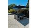 Spacious outdoor dining area with gray wicker patio furniture at 2658 48Th S St, Gulfport, FL 33711
