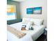 Bright bedroom with a king-size bed and beachy decor at 2658 48Th S St, Gulfport, FL 33711