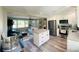Open concept kitchen and living area with modern finishes and an island at 2658 48Th S St, Gulfport, FL 33711