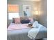 Comfortable bedroom with a king-size bed and soft color palette at 2658 48Th S St, Gulfport, FL 33711